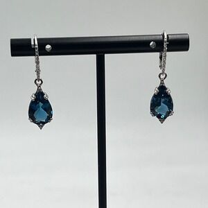 Sterling Silver Faceted London Blue
Topaz Teardrop Diamond Lever Back Earrings